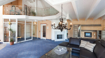 Einblick in den Wohnbereich im Penthouse mit Maisonette