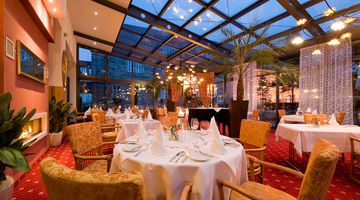 [Translate to english:] Restaurantbereich im Schlosshotel Prinz von Hessen