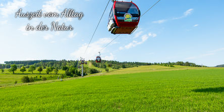 Bild von der Seilbahn in Willingen mit Schriftzug Auszeit